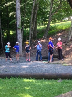 2014 cohort students on team building obstacle course